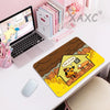 A yellow gaming mouse pad featuring a cartoon dog sitting in a burning environment.