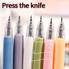 A set of colorful retractable craft knife pens with silver tips displayed against a light background.