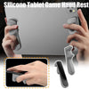 A hand holding a silicone tablet game hand rest and a separate silicone grip for gaming
