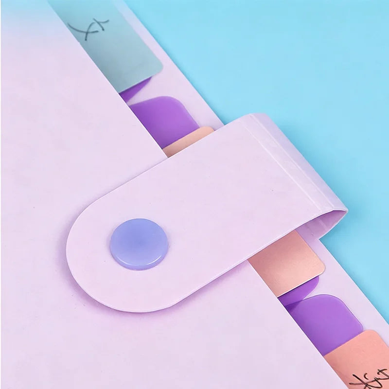 A purple and pink A4 document accordion folder with a snap button on the cover.