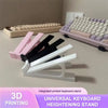 A set of pink, black, and white integrated printed 3D printed keyboard stands for height adjustment.