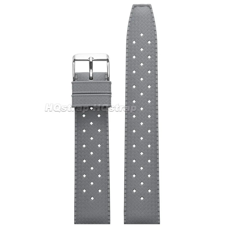 A gray perforated silicone watch strap with a metal quick release buckle.