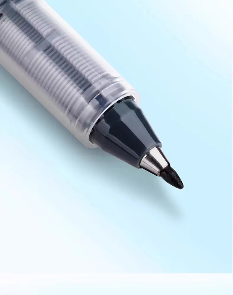 A close-up view of a clear pen with a black tip and silver clip, showing the writing instrument.