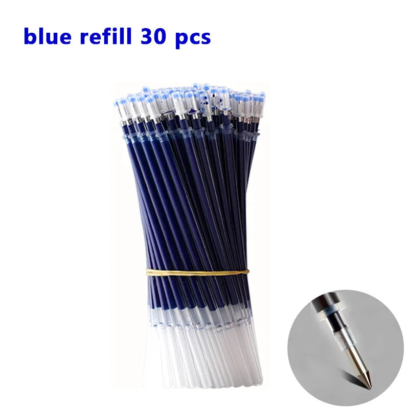Un paquete de bolígrafos de relleno azules con puntas plateadas y cuerpos blancos.