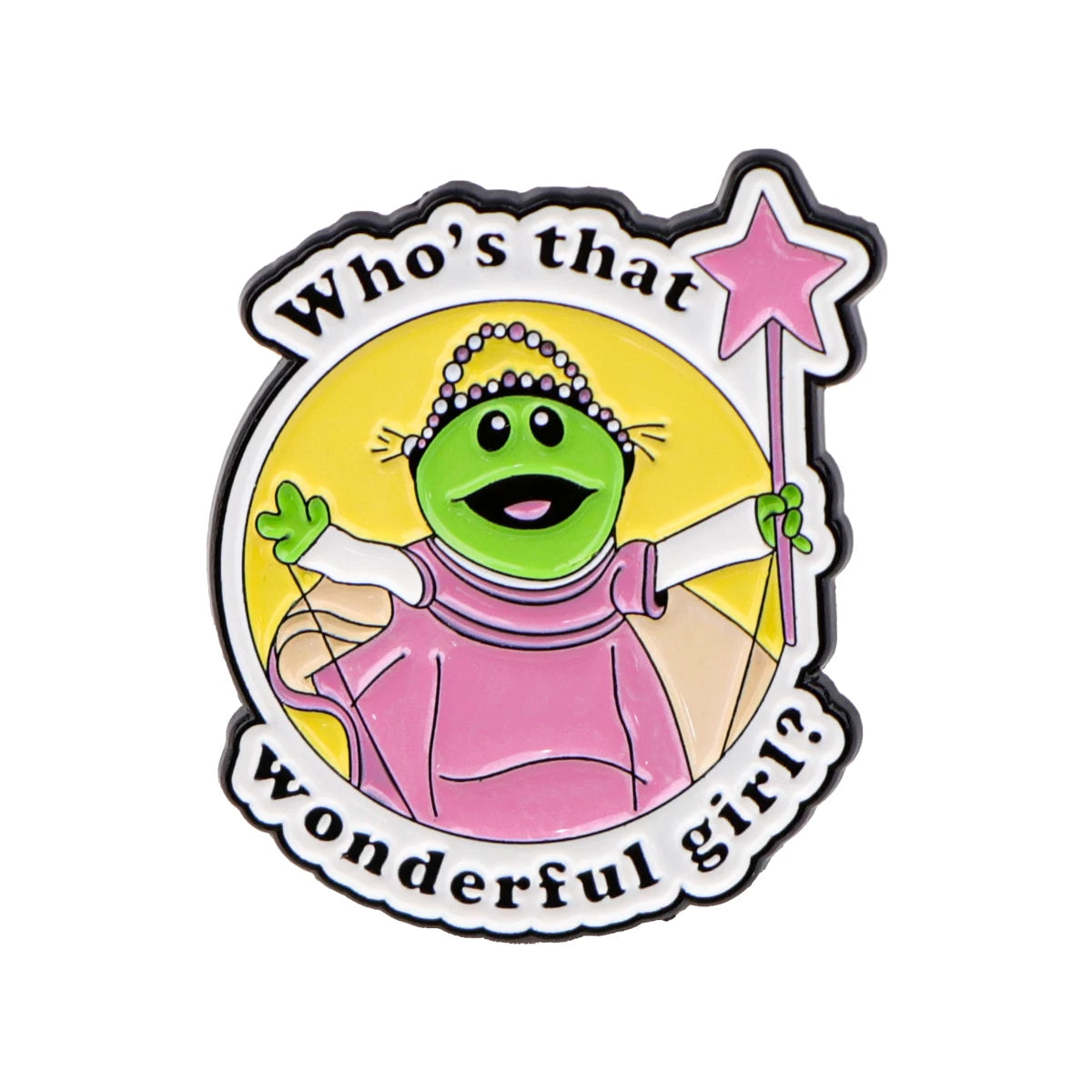 An enamel pin featuring a green, smiling frog character with pink clothing against a yellow background.
