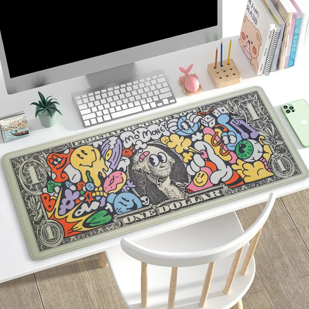 An extended gaming desk mat featuring a colorful, graffiti-style design with dollar signs and cartoon characters.