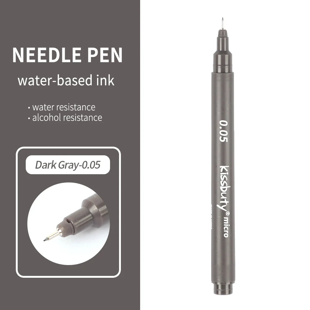 A dark gray needle pen with a silver tip and black ink, shown standing vertically.