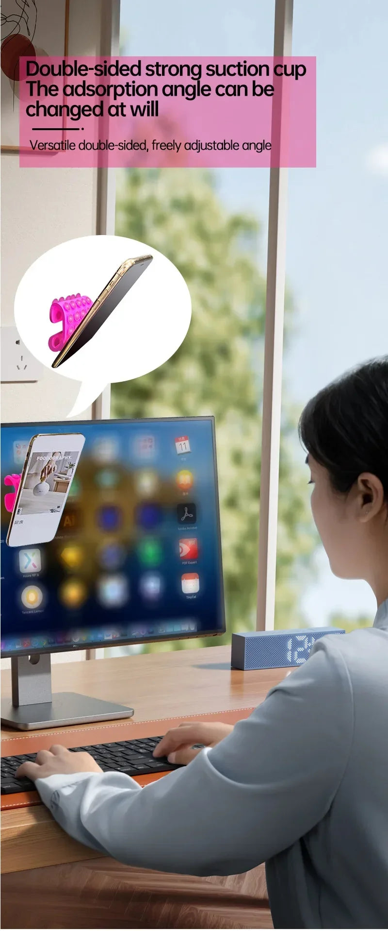 A double-sided strong suction cup phone holder is shown next to a laptop screen.