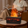 A black aroma essential oil diffuser is shown on a table, with an orange glow indicating safe power off and fragrance diffusi