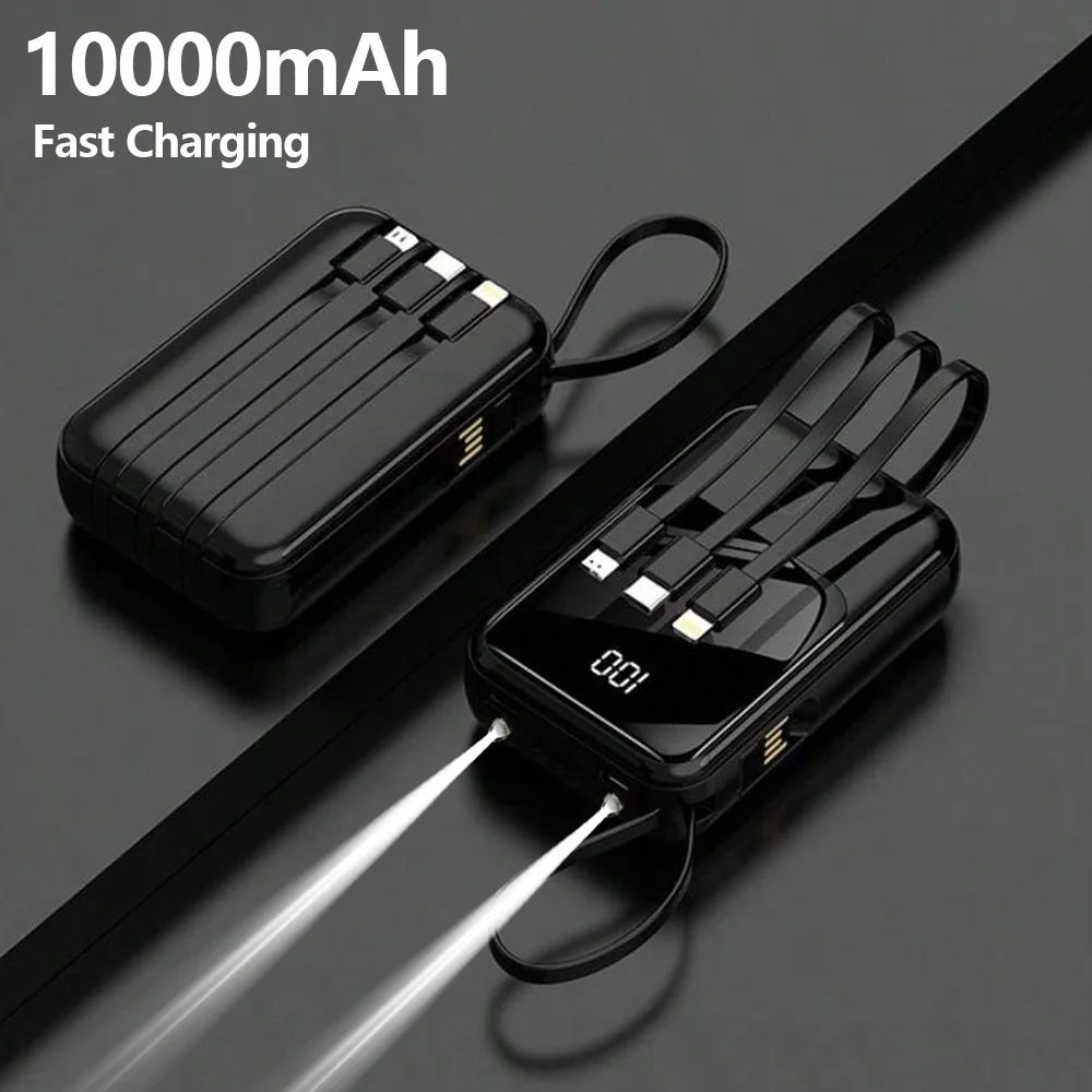 A black 10000mAh multi-port power bank with a flashlight is shown lying on a dark surface.