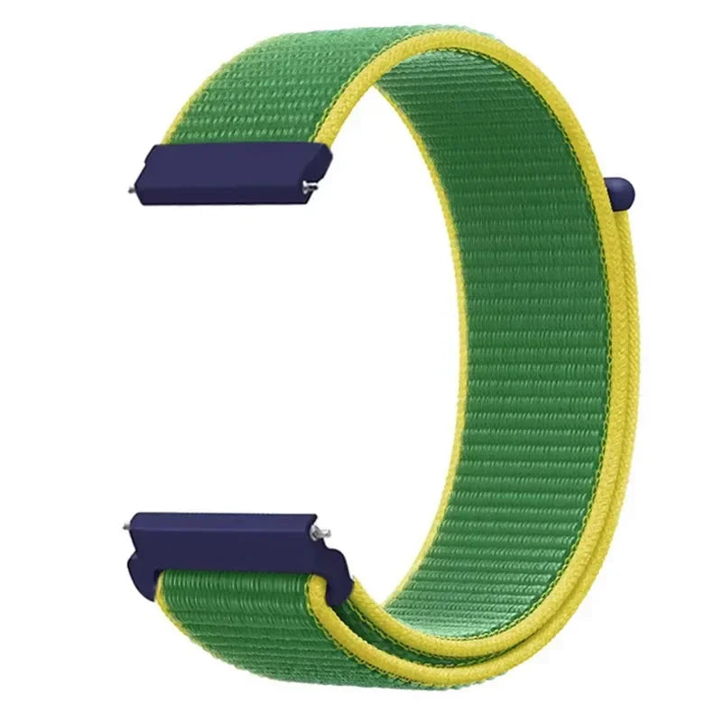 A green and yellow nylon loop watch strap is shown, featuring a purple buckle.