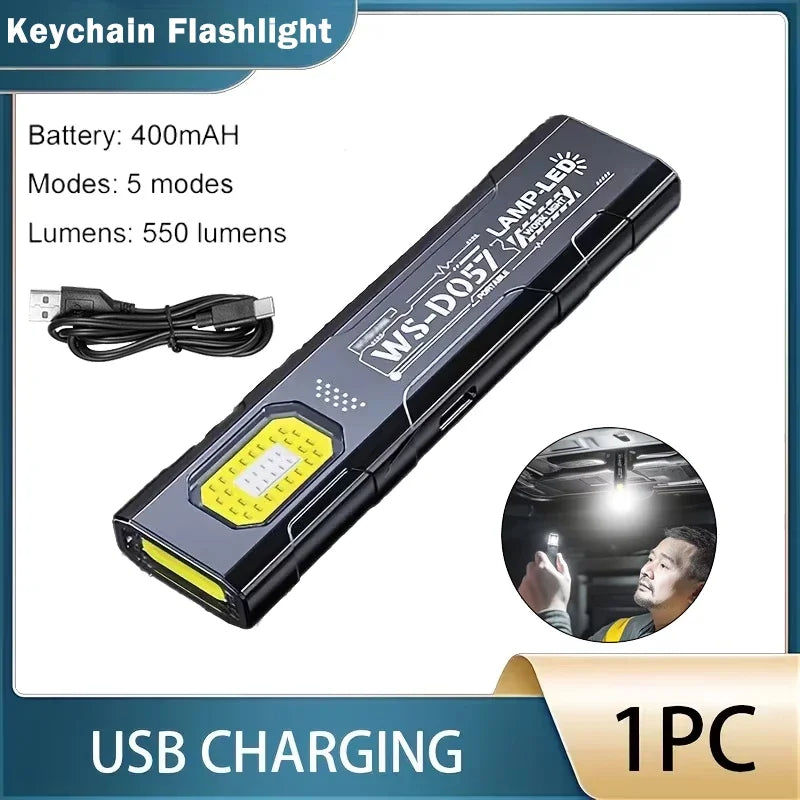 Black keychain flashlight with USB charging cable and a user holding the light.