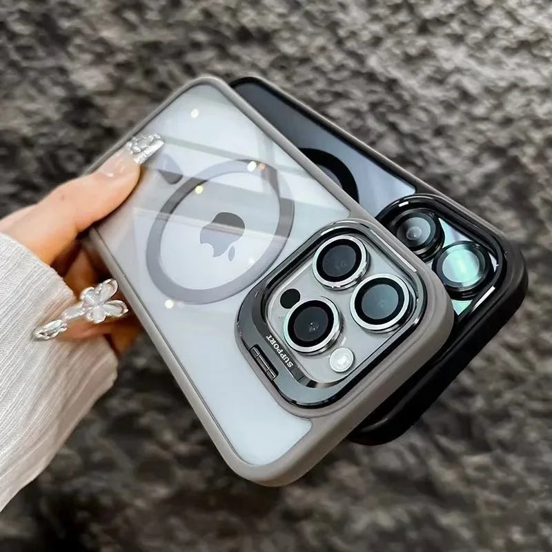 A hand holds a MagSafe-compatible phone case with a built-in camera bracket and lens cover against a gray background.
