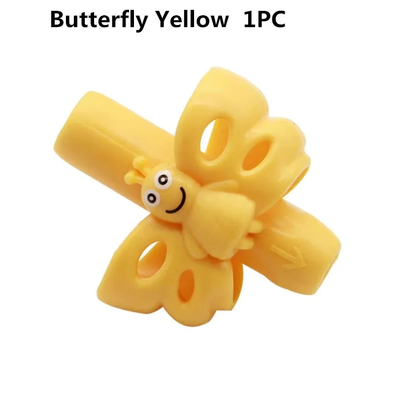 A yellow silicone pencil grip shaped like a butterfly for children's handwriting aid.