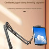 A black adjustable tablet holder with a cantilever jig design is shown on a wooden surface.