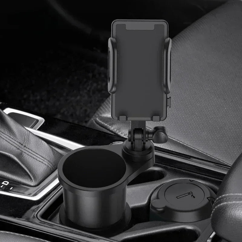 A black universal car cup holder mount with a 360-degree rotating phone holder installed in a vehicle interior.