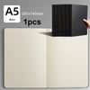 A blank A5 kraft notebook with a black cover is shown next to it.