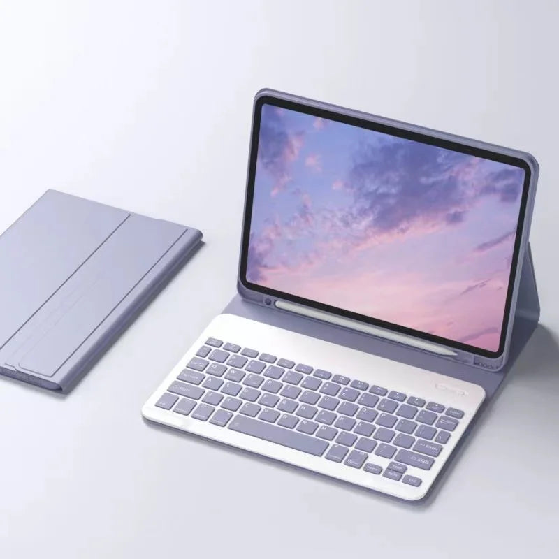 A silver iPad 9.7-inch tablet is shown open with a detachable wireless keyboard case beside it.