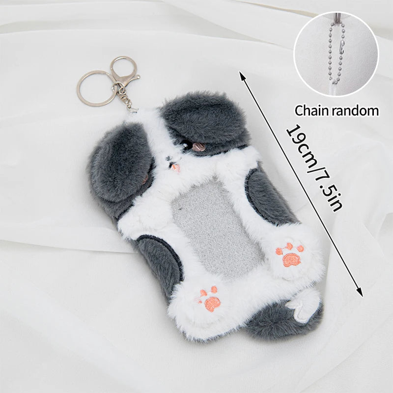 A plush photocard holder featuring a gray and white design with a chain attached.
