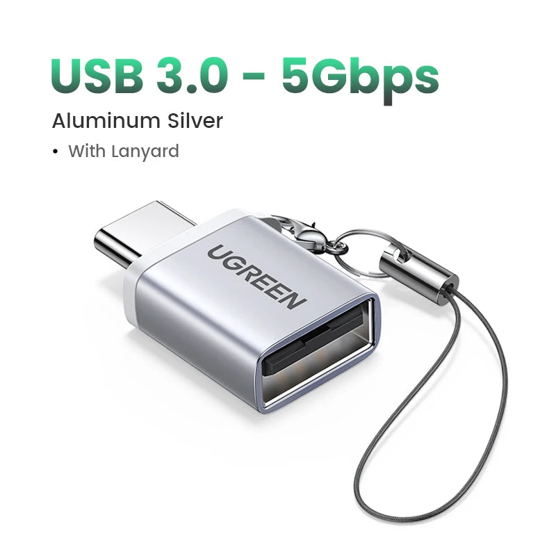 Aluminum silver USB 3.0 to 5Gbps adapter with a lanyard attached