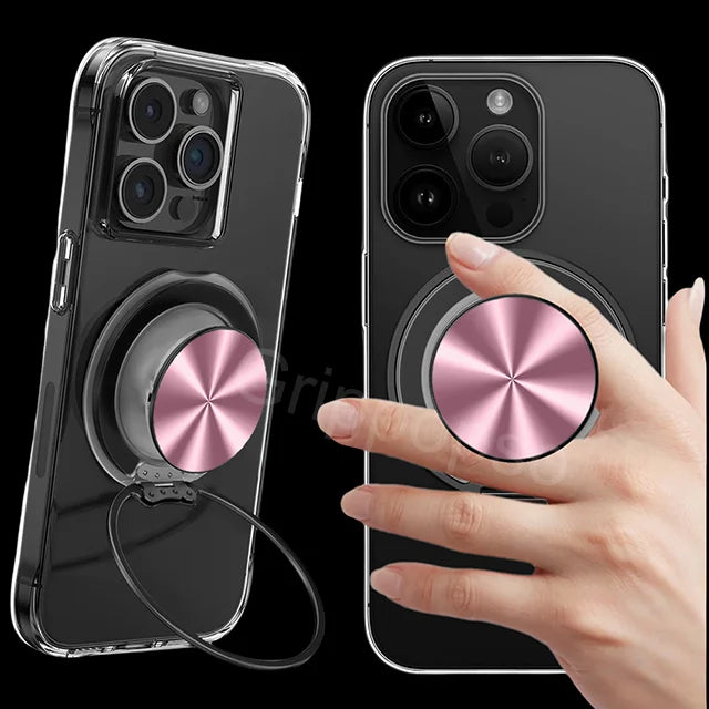 A hand holds a smartphone with a magnetic ring holder attached, showing the back of the phone and the pink magnetic ring.
