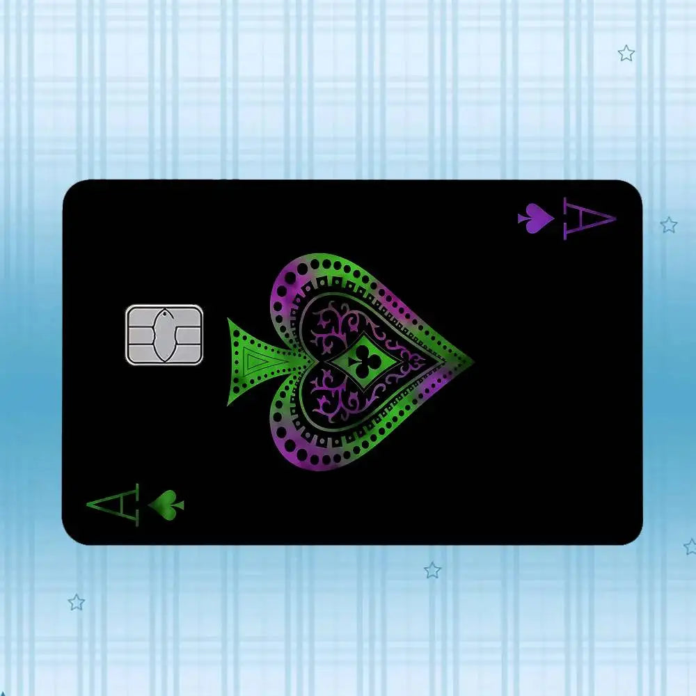 A black card featuring a purple and green holographic design with a four-leaf clover symbol.