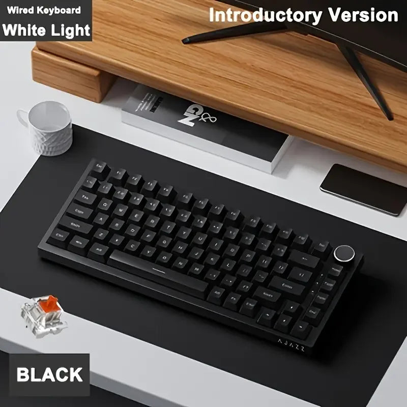 A black AJAZZ AK820 mechanical keyboard is shown on a wooden desk next to an introductory version and a white mug.
