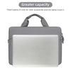 A gray laptop sleeve with a padded strap is shown, designed to hold a laptop.