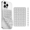 A white silicone suction cup phone holder with a flexible grip and a circular suction pad tray.