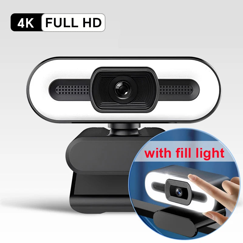 A black 4K Full HD webcam with a built-in fill light and microphone mounted on a stand.