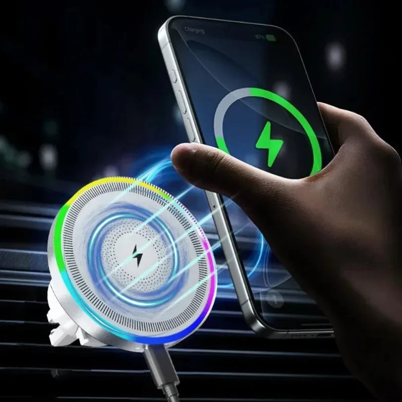 A hand holds a smartphone displaying a charging icon, next to a magnetic wireless car charger with an RGB ambient light.