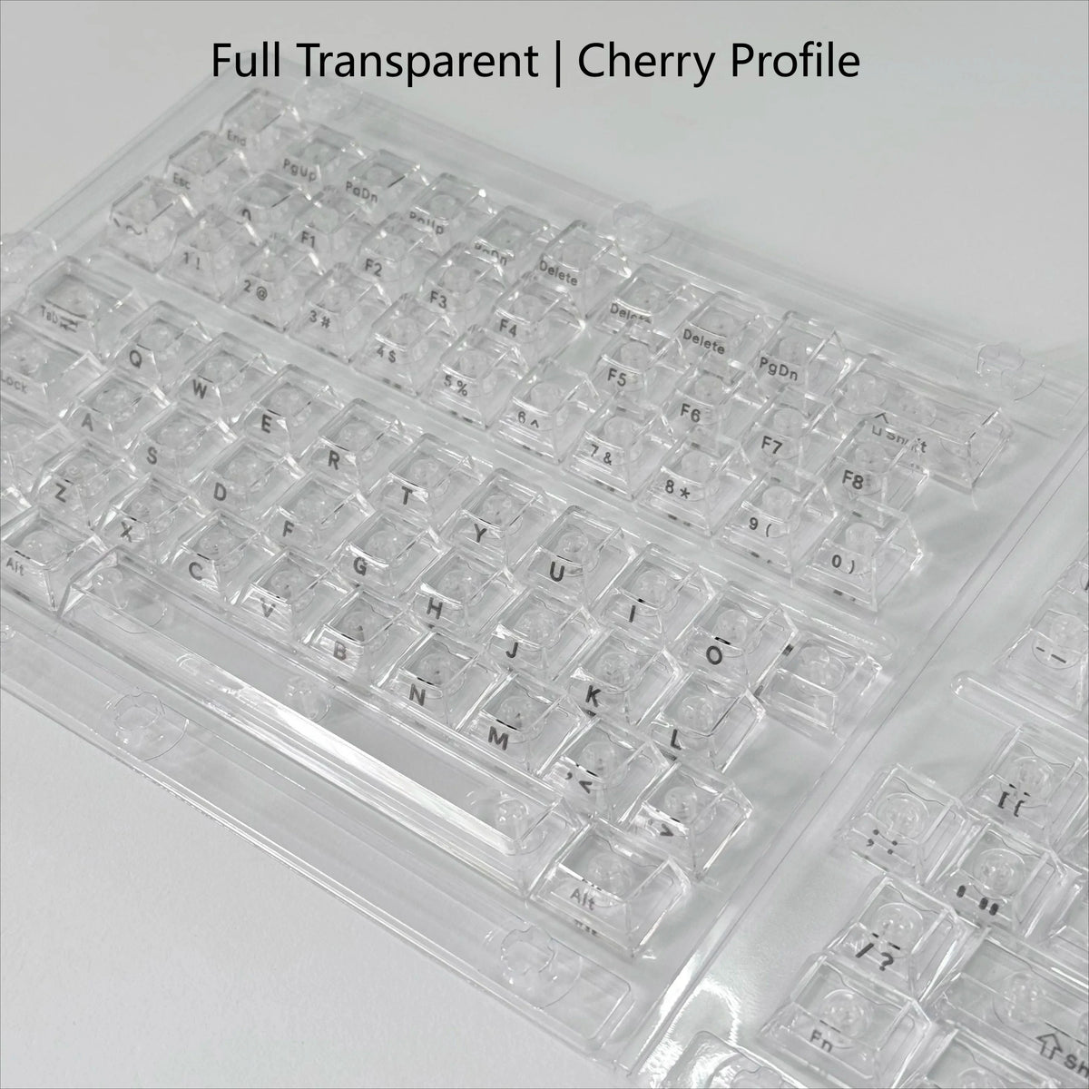 Nahaufnahme eines vollständigen, durchsichtigen Kirsch-Profil-Keycap-Sets für mechanische Tastaturen.