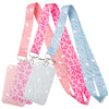 A set of pink, purple, and light blue heart-shaped lanyards for badges and keys.