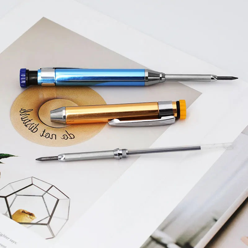 A set of six metal carpenter pencils with built-in sharpener caps in various colors, including blue, gold, and silver.