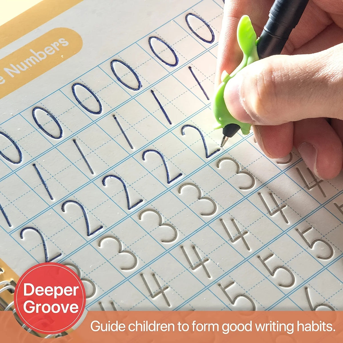 A hand writes numbers and letters on a practice sheet in a children's educational book.