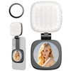 Weißes LED-Ringlichtgerät mit magnetischem Clip und ovaler Linse zusammen mit seiner Verpackung.