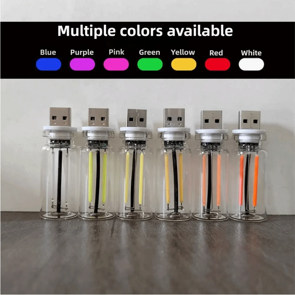A set of seven retro Edison USB LED bulbs in various colors including blue, purple, pink, green, yellow, red, and white displ