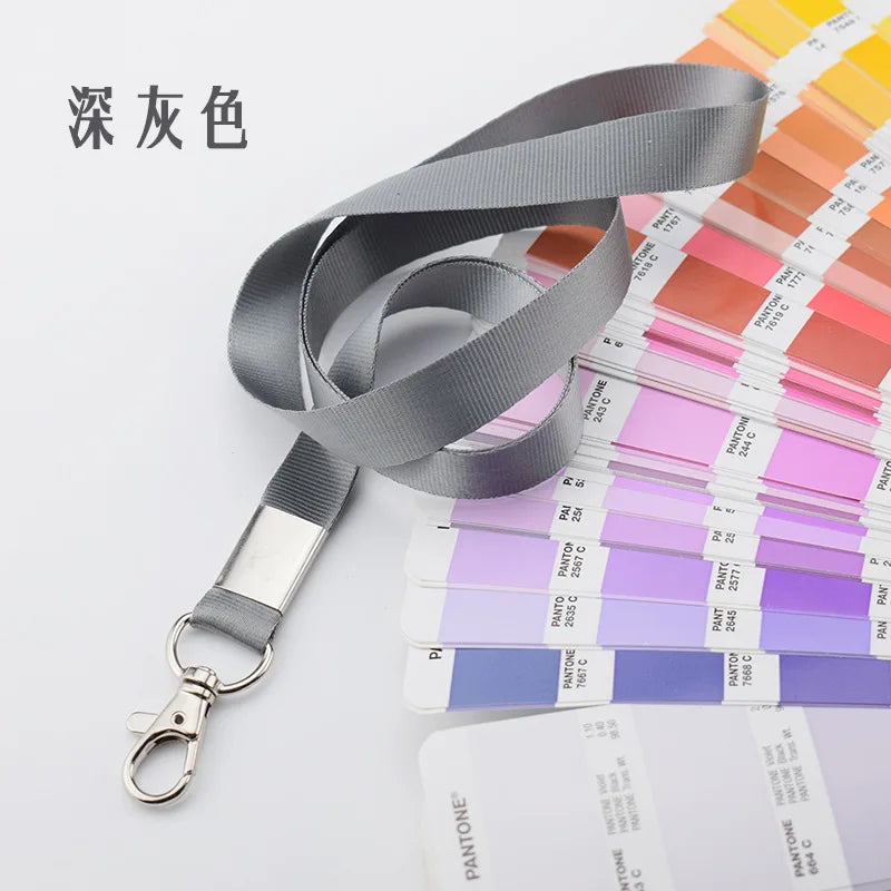 Porta identificación duradero gris con muestras de colores Pantone