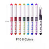 Eight assorted color fine point fountain pens standing upright in a row.