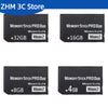 Cuatro tarjetas MagicGate Memory Stick PRO Duo con capacidades de 32GB, 16GB, 8GB y 4GB sobre un fondo oscuro.