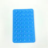 A blue silicone phone mount grip with multiple circular holes for mounting devices.