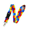 Buntes Puzzle-Teil-Muster-Lanyard mit schwarzem Band und Metall-Schlüsselring.