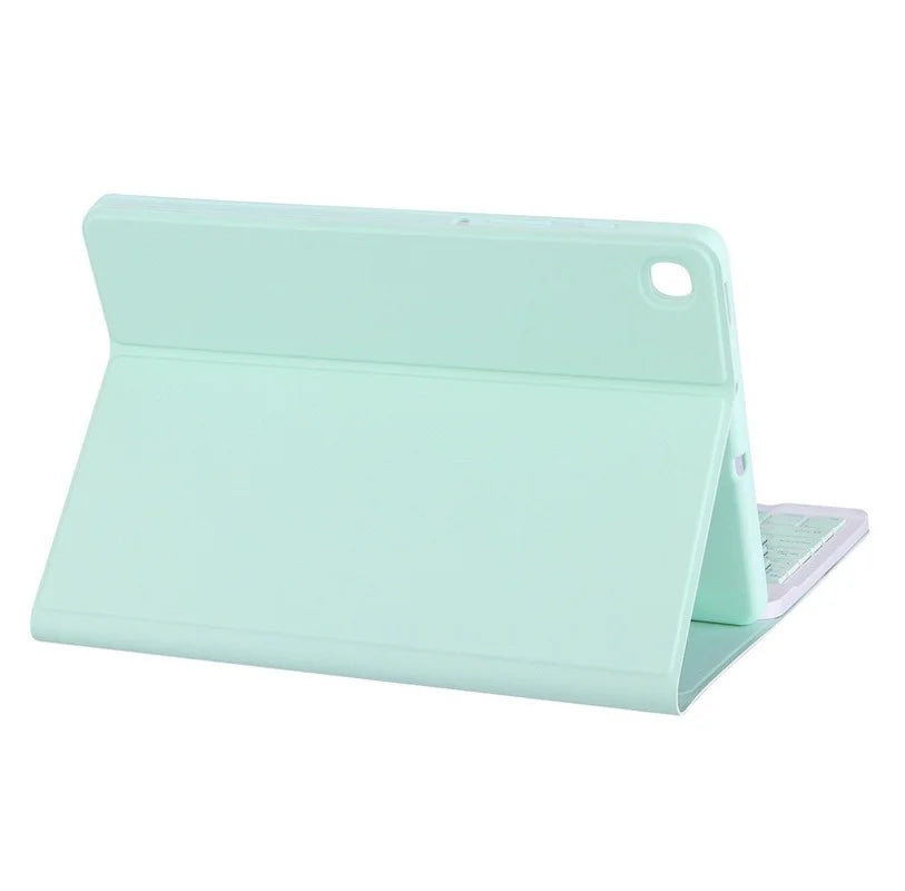 Light mint green leather keyboard case with a detachable Bluetooth keyboard for an iPad.