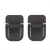 A pair of black portable laptop keyboard riser stands.