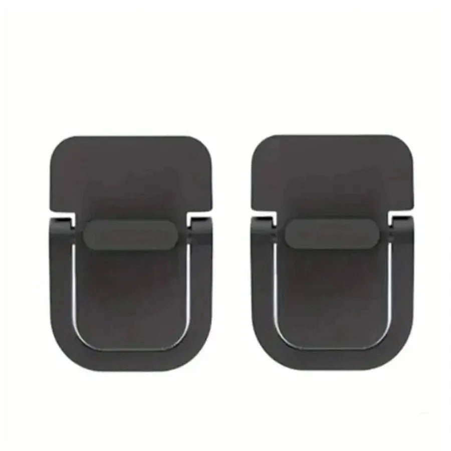 A pair of black portable laptop keyboard riser stands.