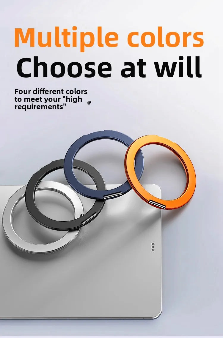Four different colored magnetic tablet holders are displayed on a silver surface.