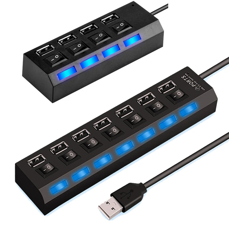 A black USB hub splitter extender with seven ports and blue indicator lights, shown from above and in use.