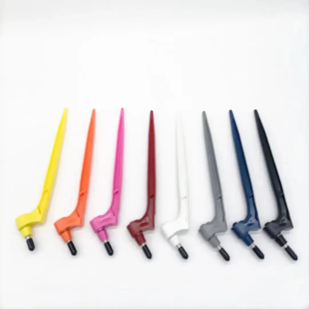 A set of seven colored steel art cutting tools, including yellow, orange, pink, red, white, gray, and blue.