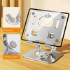 A silver tablet stand with a rotating base and non-slip silicone grooves for secure placement.