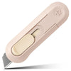 A pink portable mini paper cutter with a blade and a numbered guide.